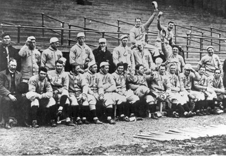 The 1912 champion Red Sox (that?s Smoky Joe Wood waving his cap up at top).
